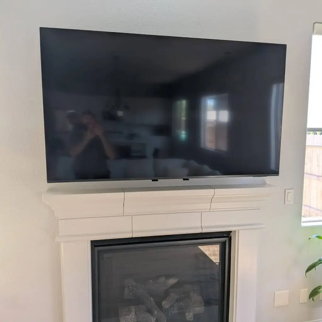 Pull Down TV Mount Installation in Turlock — fireplace TV mount